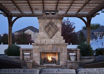 Outdoor fireplace and pergola installation