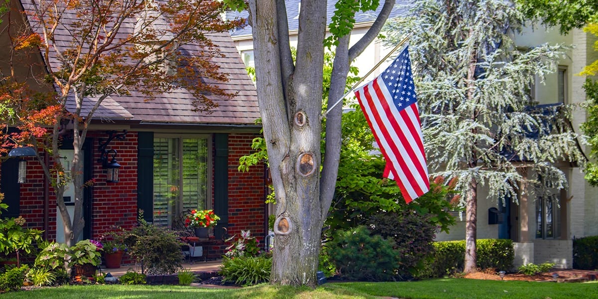 advantages-of-big-trees-brick-house-american-flag