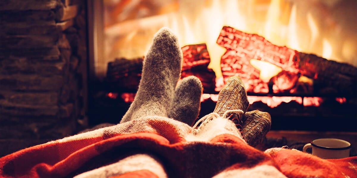 platt-hill-holiday-decor-trends-cozy-blanket-fireplace