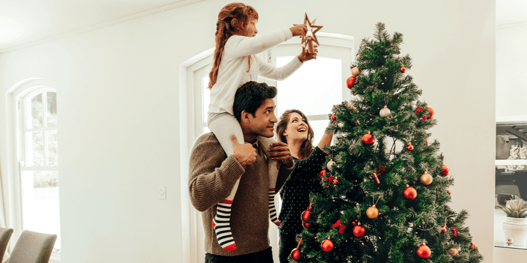 Platt Hill Nursery family decorating Christmas tree